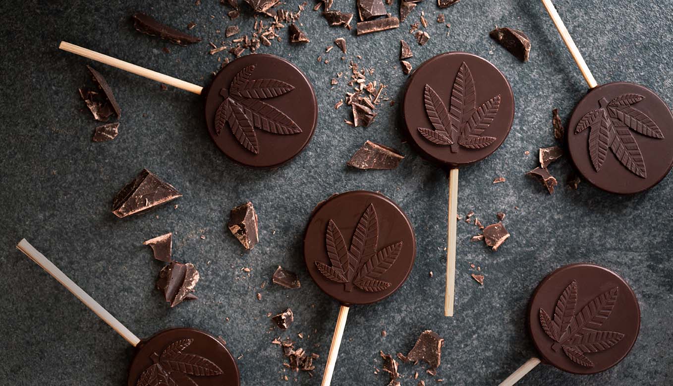 Cannabis infused chocolate lollipops with THC and CBD oil.