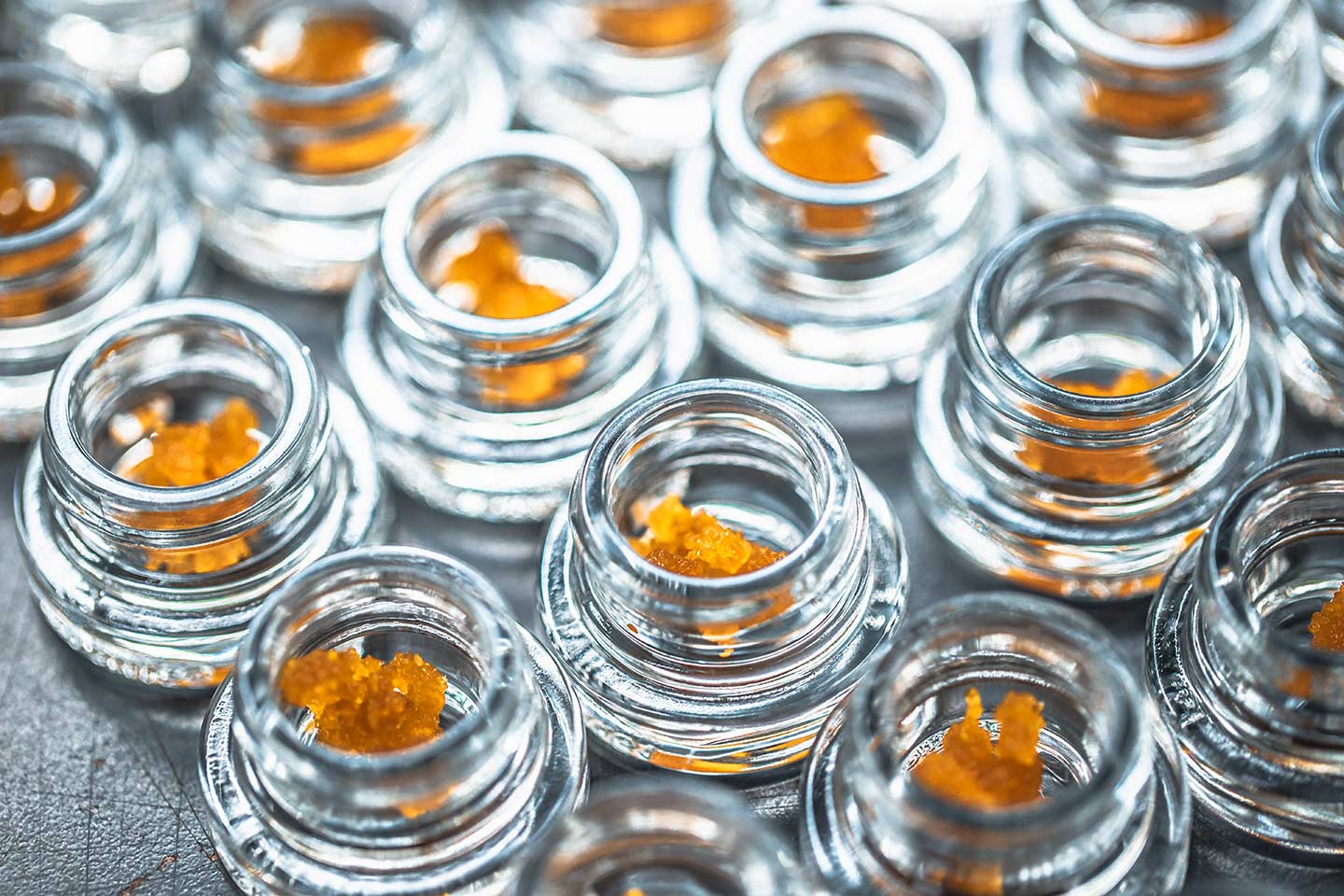 many open jars of Cannabis Concentrates